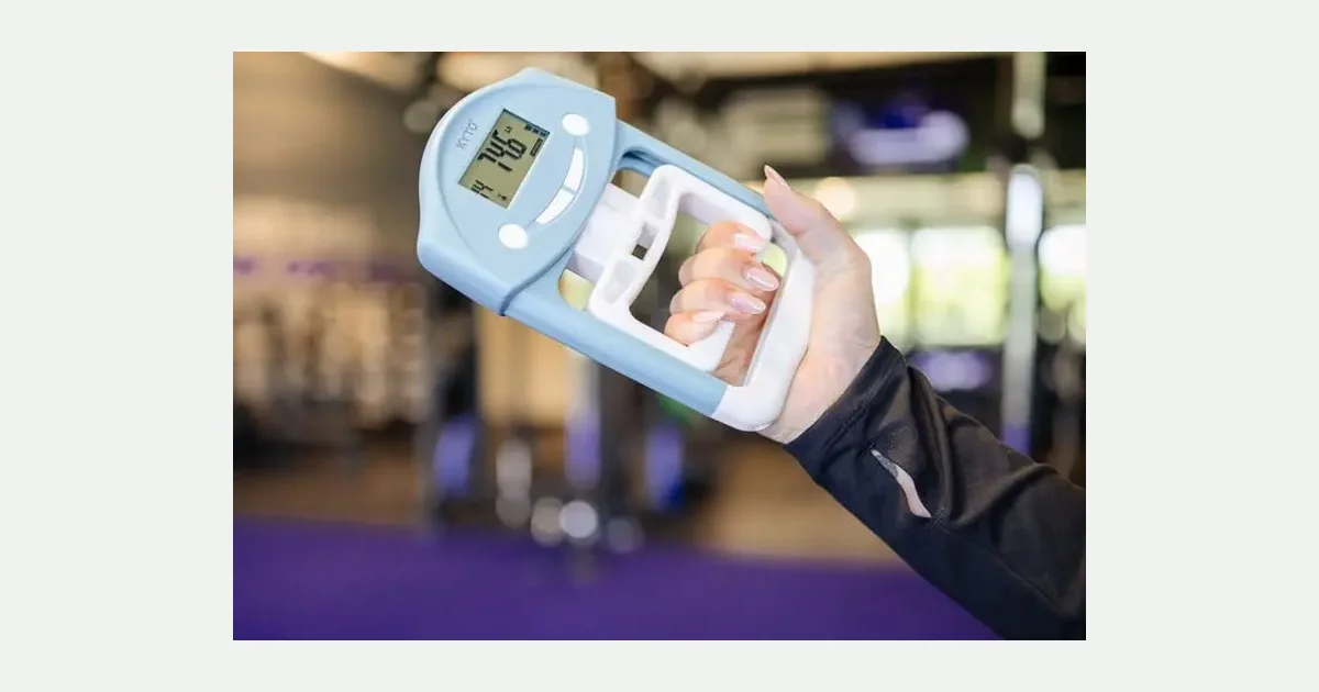 Hand grip strength being measured with a handheld dynamometer